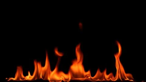 Fire flames on black background. Stock Photos