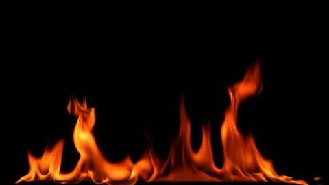 Fire flames on black background. Stock Photos