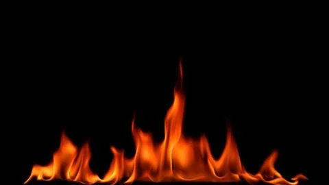 Fire flames on black background. Stock Photos