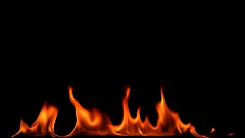 Fire flames on black background. Stock Photos