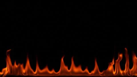 Fire flames on black background. Stock Photos