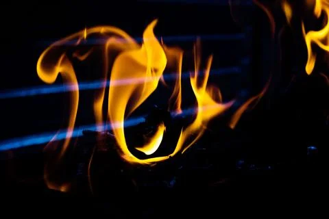 Fire flames on black background Stock Photos