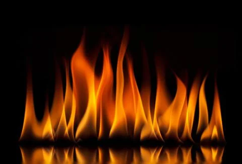 Fire flames on a black background Stock Photos