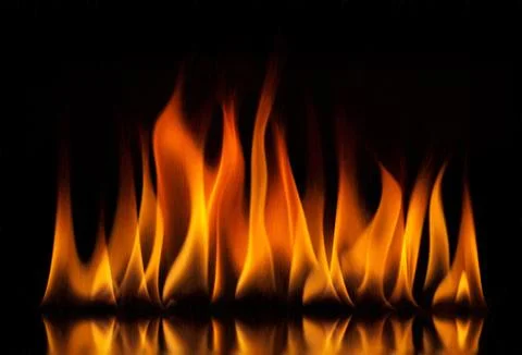 Fire flames on a black background Stock Photos