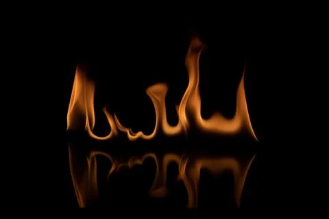 Fire flames on black background. Stock Photos