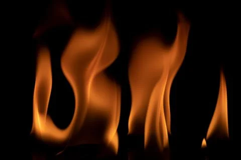Fire flames on black background. Stock Photos