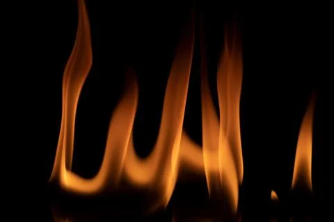 Fire flames on black background. Stock Photos
