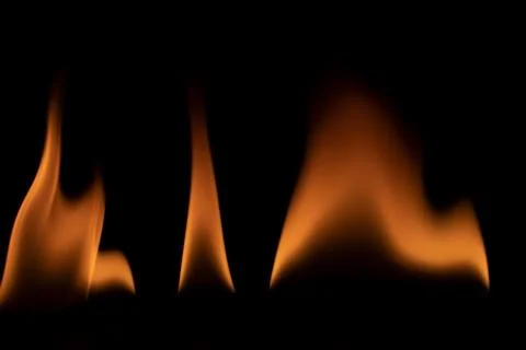 Fire flames on black background. Stock Photos