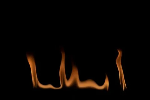 Fire flames on black background. Stock Photos