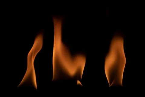 Fire flames on black background. Stock Photos