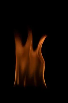 Fire flames on black background. Stock Photos
