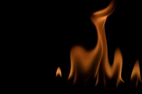 Fire flames on black background. Stock Photos