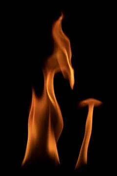 Fire flames on black background. Stock Photos