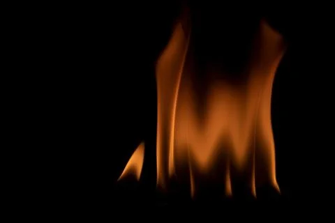 Fire flames on black background. Stock Photos