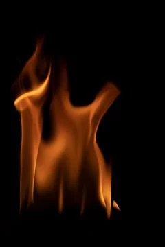 Fire flames on black background. Stock Photos