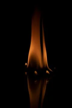 Fire flames on black background. Stock Photos