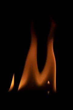 Fire flames on black background. Stock Photos