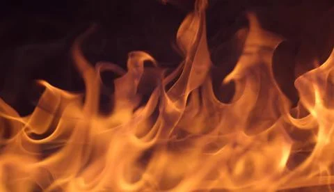 Fire flames on black background Stock Photos