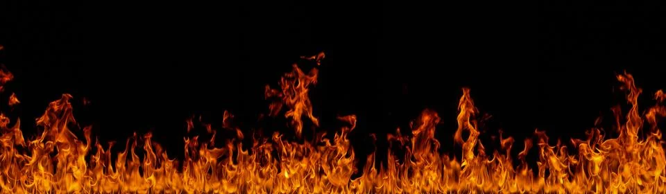 Fire flames on black background Stock Photos