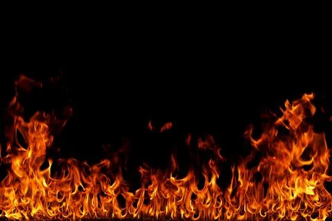 Fire flames on black background. Stock Photos