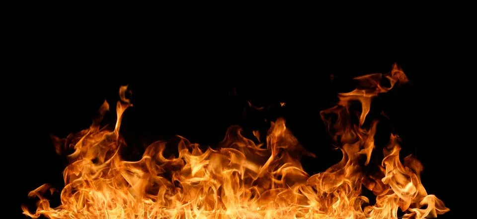 Fire flames on black background. Stock Photos