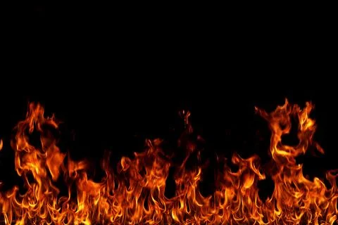 Fire flames on black background. Stock Photos