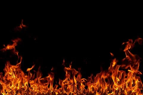 Fire flames on black background. Stock Photos
