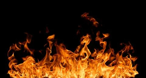 Fire flames on black background. Stock Photos