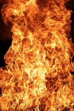 Fire flames with blazing texture. Fire background black and dark. Fire flame  Stock Photos