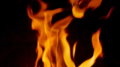 Fire Flames Burning in Fireplace on Black Background Slow Motion Stock Footage 106999557