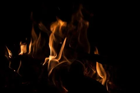 Fire flames close-up on a dark background Stock-Fotos