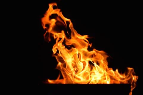 Fire flames design isoleted on black background Stock Photos