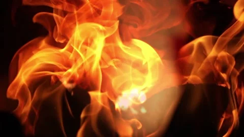 Fire flames with flying sparks close up. Abstract texture of blazing fire, .. Stock Footage 337346827