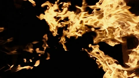 Fire Flames Igniting and blazing up in Slow Motion isolated on black background Stock Footage 113263715