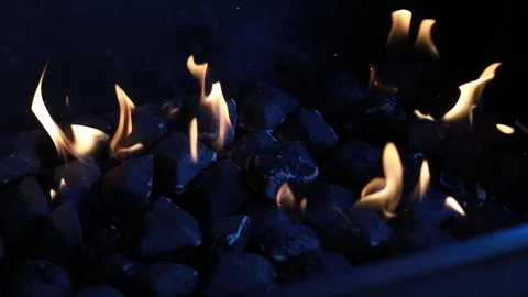 Fire Flames Igniting And Burning. A line of real flames ignite on a black Stock Footage 108476329