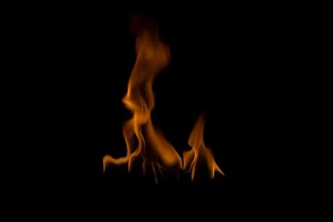 The fire flames is powerful , Shoot in a studio with a black background. Stock Photos