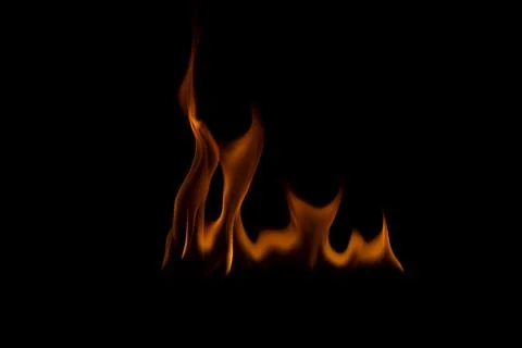 The fire flames is powerful , Shoot in a studio with a black background. Stock Photos