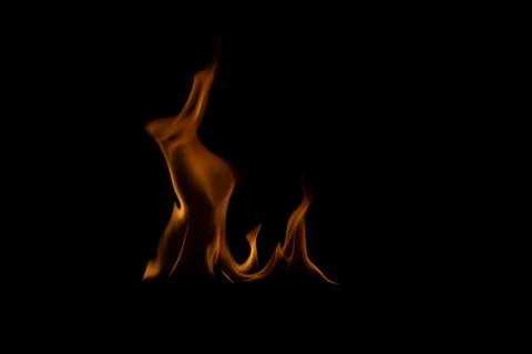 The fire flames is powerful , Shoot in a studio with a black background. Stock Photos