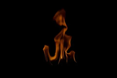 The fire flames is powerful , Shoot in a studio with a black background. Foto stock