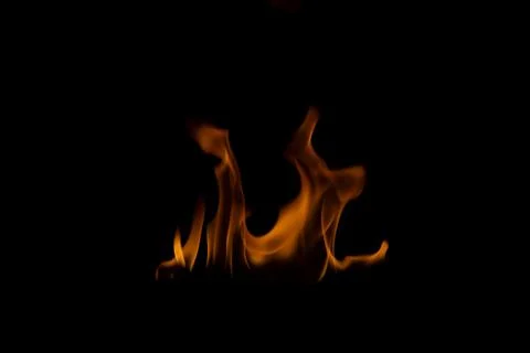 The fire flames is powerful , Shoot in a studio with a black background. Stock Photos