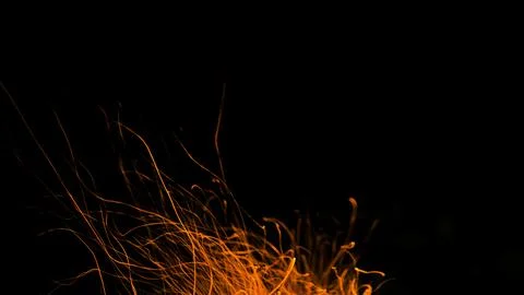 Fire flames with sparks on a black background Stock Photos