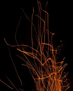Fire flames with sparks on a black background Stock Photos
