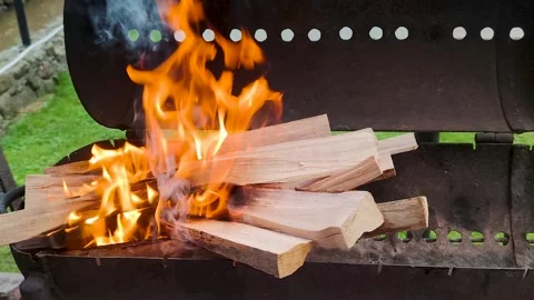 Fire Flames with Sparks close-up. Flame Motion with Empty Grill Grate Stock Footage 249002417