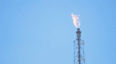 Fire from flare structure in petroleum plant Stock Footage 62845487