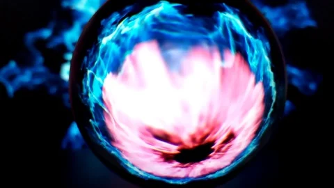 Fire flashes of a multi-colored flame. View through a crystal ball. Stock Footage 117695188