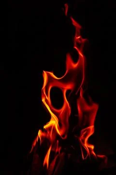 Fire forms with hole abstraction in black background Stock Photos