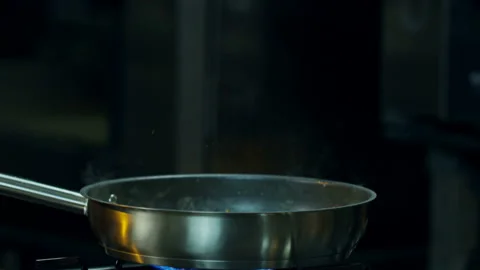Fire In Frying Pan Stock Footage 145643325