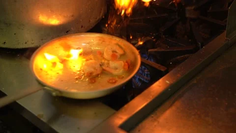 Fire on frypan Stock Footage 155198367