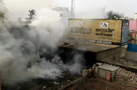 Fire at garbage dump yard in Bangalore, India - 07 Dec 2018 Stock Photos