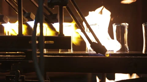 Fire, glasses on the conveyor Stock Footage 171601379